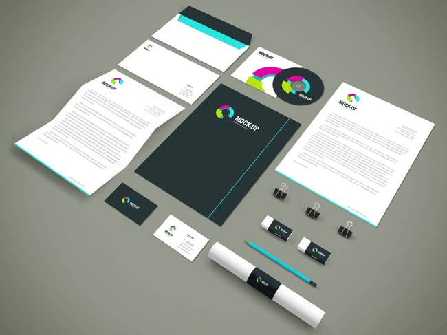 example of brand materials, including business cards, stationery, and letterheads